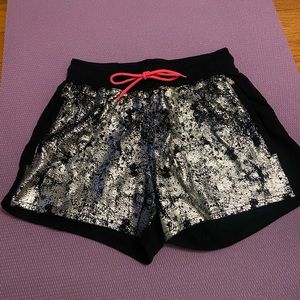 Small Zumba Shorts. Glittery design with pink drawstring. Only worn one time.